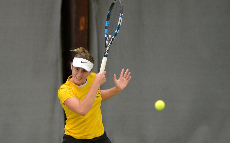 Vicenza's Catherine Gulihur slams the ball back across the net in her 6-0, 6-0 semifinal win against Bahrain's Chloe McHenry at the DODEA-Europe tennis finals in Wiesbaden, Germany, Friday, Oct. 27, 2017. She will face Wiesbaden's Charlotte Kordonowy in Saturday's championship match.

