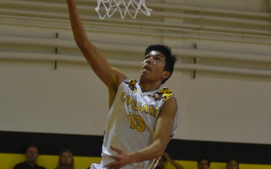 Vicenza's Angel Grawau goes up for a basket after stealing the ball against Stuttgart in the Cougars' 53-52 loss to the Panthers on Friday.