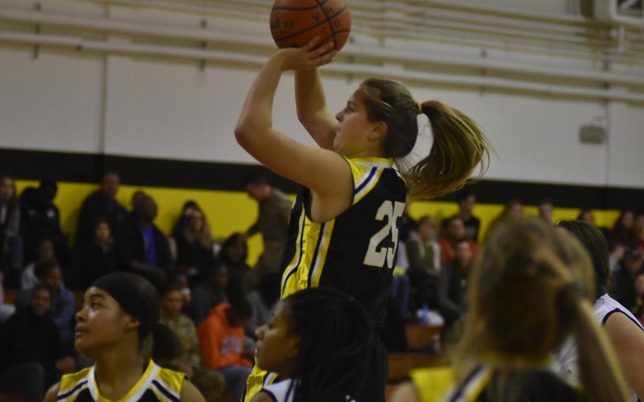 Stuttgart's Allyson Taylor towers over friend and foe while putting up a jump shot Friday in the Panthers' 42-16 victory over Vicenza.