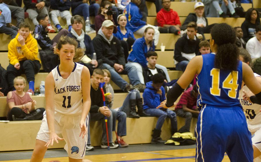 Black Forest Academy's Katie Greathouse dribbles against Wiesbaden during a DODEA-Europe basketball game Saturday, Dec. 9, 2017 in Wiesbaden, Germany. Greathouse finished with 10 points and six rebounds in a 43-16 BFA win. 