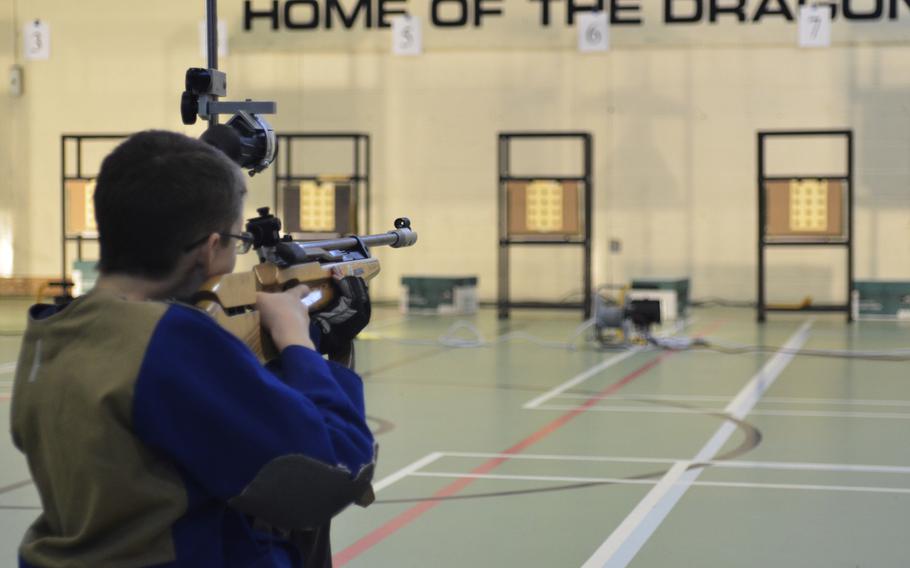 Spangdahlem’s Evann Richardson fires at a 10-meter target from a standing position in the first western conference marksmanship match at RAF Alconbury, England, Saturday, December 9, 2017. Shooters have 15 minutes to finish firing while in the standing position during the match.