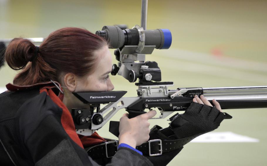 Wiesbaden shooter Honor Stackpole fires at a 10-meter target from the prone position during the first western conference high school marksmanship match at RAF Alconbury, England, Saturday, December 09, 2017. Stackpole earned third place in the match with a total score of 276.