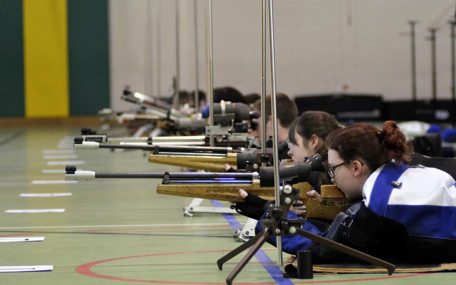Shooters from Wiesbaden, Baumholder, Spangdahlem, Kaiserslautern, SHAPE and Alconbury prepare to fire from the prone in the first western conference high school marksmanship match at RAF Alconbury, England, Saturday, December 9, 2017. Kaiserslautern won the match with a team score of 1,102. 