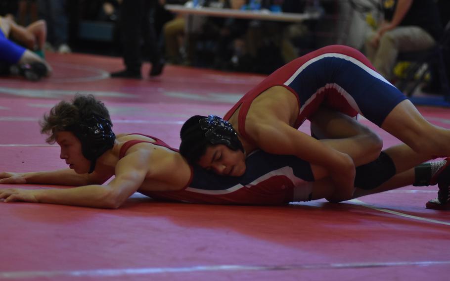 Aviano teammates Liam Knowles, left, and Jacob Gamboa both reached the final matches in their weight classes a year ago. Saturday, they wrestled each other at 138 pounds after a shortage of wrestlers in Knowles' weight class. Gamboa earned the victory.