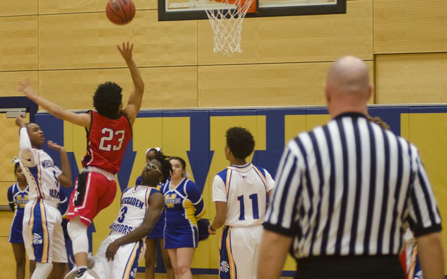 Isiah Washington of Kaiserslautern attacks the basket against Wiesbaden defenders during a holiday tournament matchup Monday, Dec. 18, 2017 in Wiesbaden, Germany. Kaiserslautern stormed out to an early lead to beat the Warriors 62-54 to finish the tournament 5-1. 
