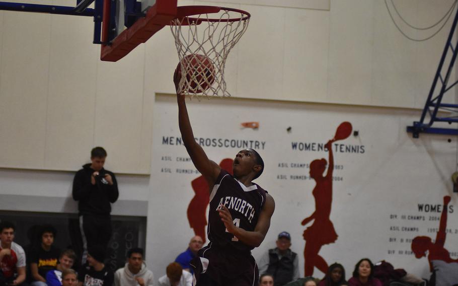 AFNORTH's Isaiah Darrisaw scores after a steal in the Lions' 53-43 loss to Aviano on Friday at Aviano Air Base, Italy.