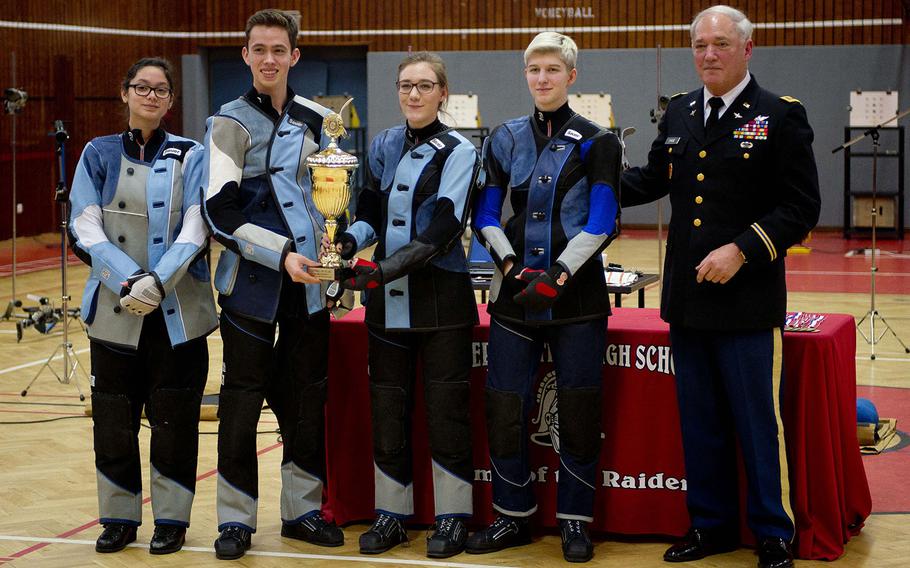 The Stuttgart marksmanship team poses with Maj. Robert Hase, director of Army instruction for DODEA-Europe JROTC, after winning the DODEA-Europe Marksmanship championship at Vogelweh, Germany, on Saturday, Feb. 3, 2018.