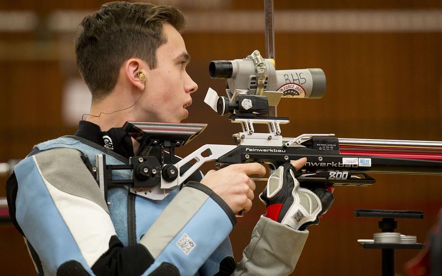 Stuttgart's Callum Funk checks his shot placement during the DODEA-Europe Marksmanship championship at Vogelweh, Germany, on Saturday, Feb. 3, 2018. Funk took the top overall shooter spot with 574 points. 