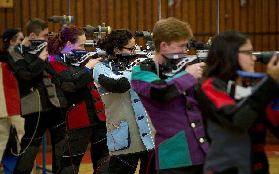 Shooters compete during the DODEA-Europe Marksmanship championship at Vogelweh, Germany, on Saturday, Feb. 3, 2018.