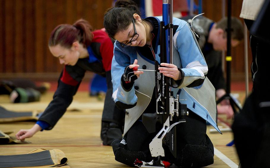 Stuttgart's Isabelle Ploechinger makes adjustments to her rifle during the DODEA-Europe Marksmanship championship at Vogelweh, Germany, on Saturday, Feb. 3, 2018. Ploechinger was second best overall shooter with 572 points. 