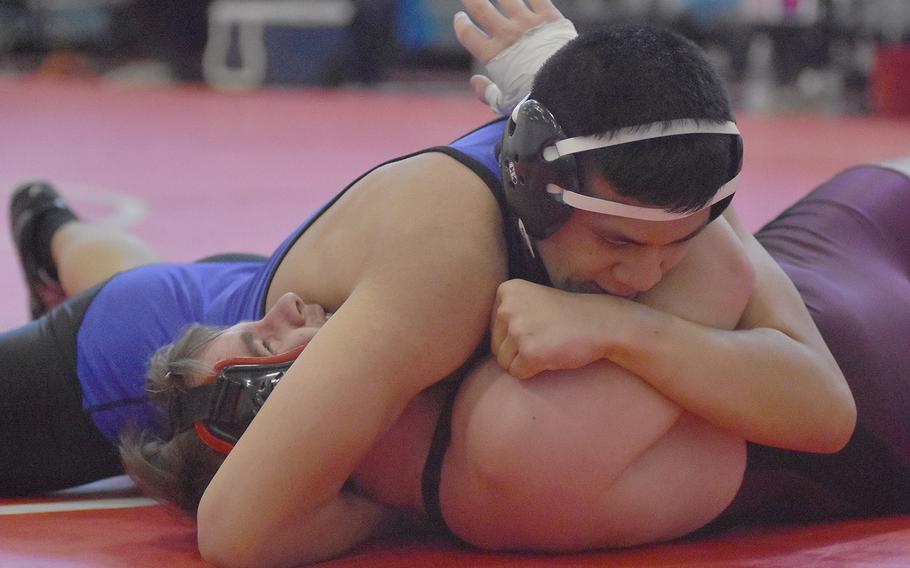 Hohenfels' Jarod Liwanag pins Vilseck's Jordan Leghty in a 170-pound match Saturday at the southern sectionals.