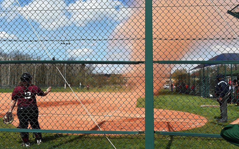 A sandstorm springs up during a softball game at Vilseck, Germany, Saturday, April 14, 2018. 
