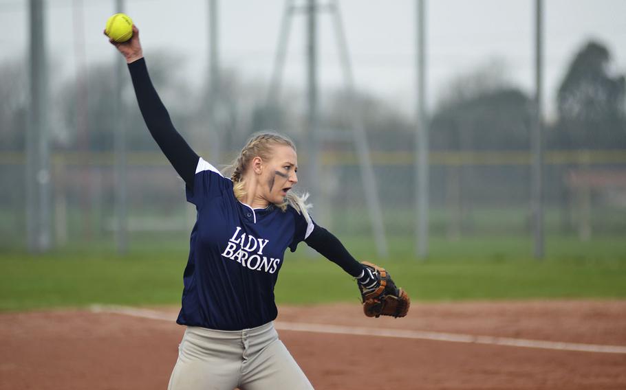 Spangdahlem's Ashley Otto pitches against the Lancers during a high school softball doubleheader at RAF Lakenheath, England, Saturday, April 14, 2018. 