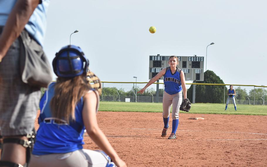 Rota's Grace Lagger watches a pitch head toward catcher Bree Dignan in the Admirals' 18-8 victory over Aviano on Saturday, April 28, 2018.