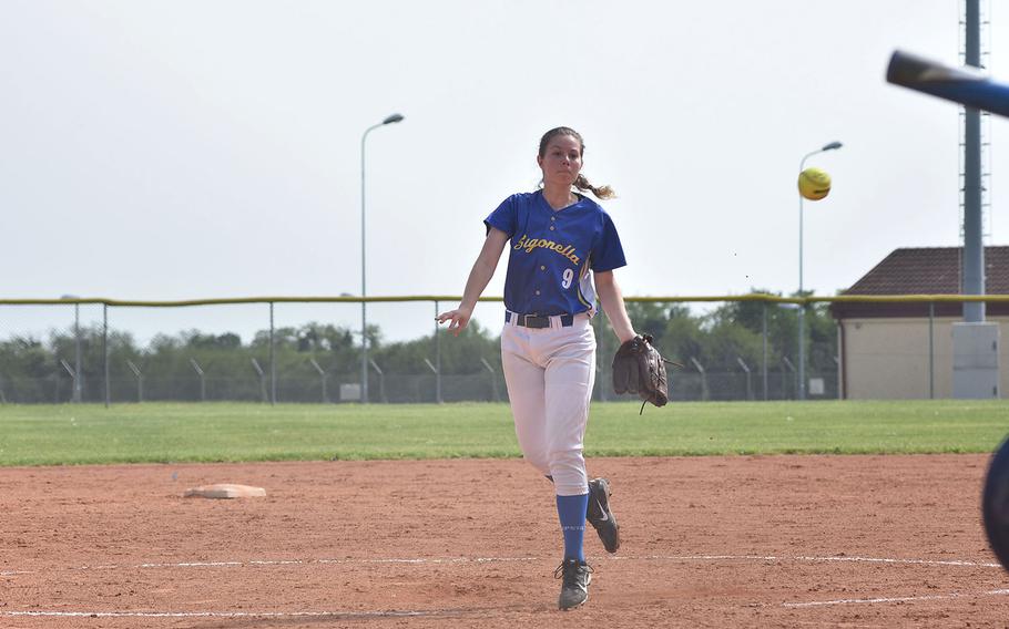 Sigonella pitcher Hanna Zarum appears to dance her way toward home while pitching against Aviano on Saturday, April 28, 2018.