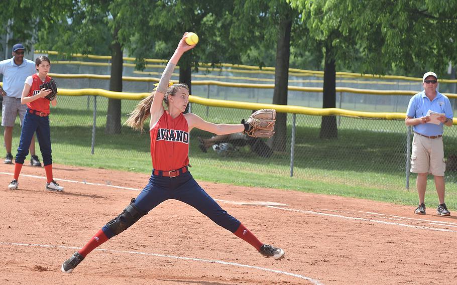 Aviano's Lizzy Bond extends fully while maknig a pitch toward home on Saturday, April 28, 2018 in the Saints' 7-6 loss to Sigonella.