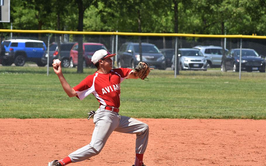 Aviano shortstop Jacob Gamboa throws the ball to first after fielding a grounder on Saturday, May 12, 2018.
