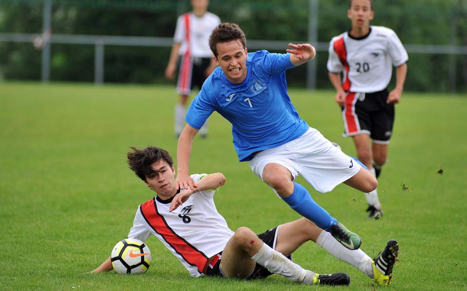 AOSR's Christian Sjoman fouls Marymount's Julian Van Hensbergen in a Division II semifinal at the DODEA-Europe soccer finals in Reichenbach, Germany, Wednesday, May 23, 2018. Sjoman was sent from the field for the foul, and Marymount won 4-2 to advance to Thursday's final.