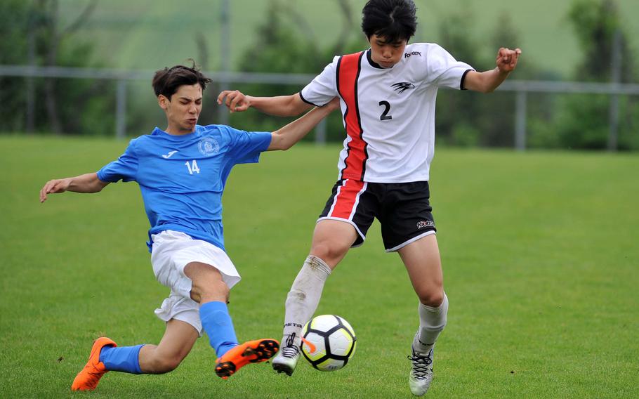 Marymount's Giovanni Taricone, left, tries to get the ball from AOSR's Seung Hyun Na in a Division II semifinal at the DODEA-Europe soccer finals in Reichenbach, Germany, Wednesday, May 23, 2018. Marymount won 4-2 to advance to Thursday's final.