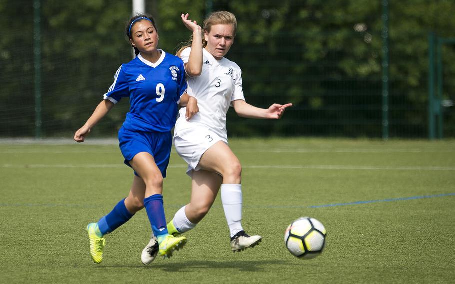 Wiesbaden's Mia Rangel, left, and Ramstein's Leisel Mendenhall battle for the ball during the DODEA-Europe soccer championships in Reichenbach, Germany, on Wednesday, May 23, 2018. Wiesbaden lost the Division I semifinal match 3-1.
