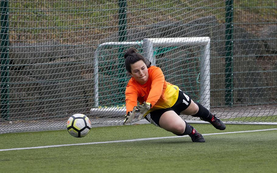 AFNORTH's Rachel Lee dives for a penalty kick during the DODEA-Europe soccer championships in Reichenbach, Germany, on Wednesday, May 23, 2018. AFNORTH lost the Division II semifinal match against Rota 3-1.
