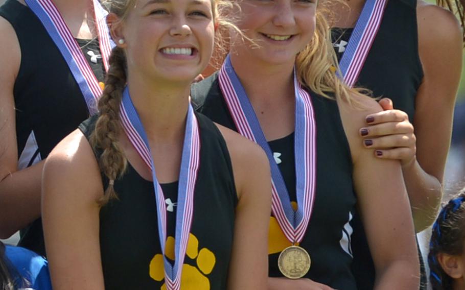 Stuttgart won the girls 4x800-meter relay at the DODEA-Europe track and field championships in Kaiserslautern, Germany, in 9 minutes, 536.33 seconds. The champions from left to right are Tatiana Smith, Katie McLellan, McKinley Fielding and Kate Bowman.