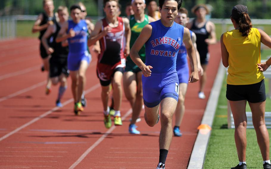 Ramstein's Jose Serrano leads the pack in the boys 1,600-meter race at the DODEA-Europe track and field championships in Kaiserslautern, Germany, Friday, May 25, 2018. Serrano won in 4 minutes, 28.73 seconds.