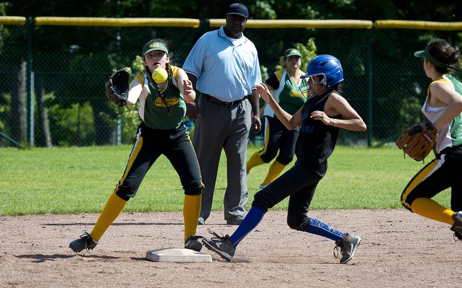 Hohenfels' Esmerelda Martinez, right, is safe at second ahead of a throw to Alconbury's Aminah Markarian during the DODEA-Europe softball tournament at Ramstein Air Base, Germany, on Friday, May 25, 2018.