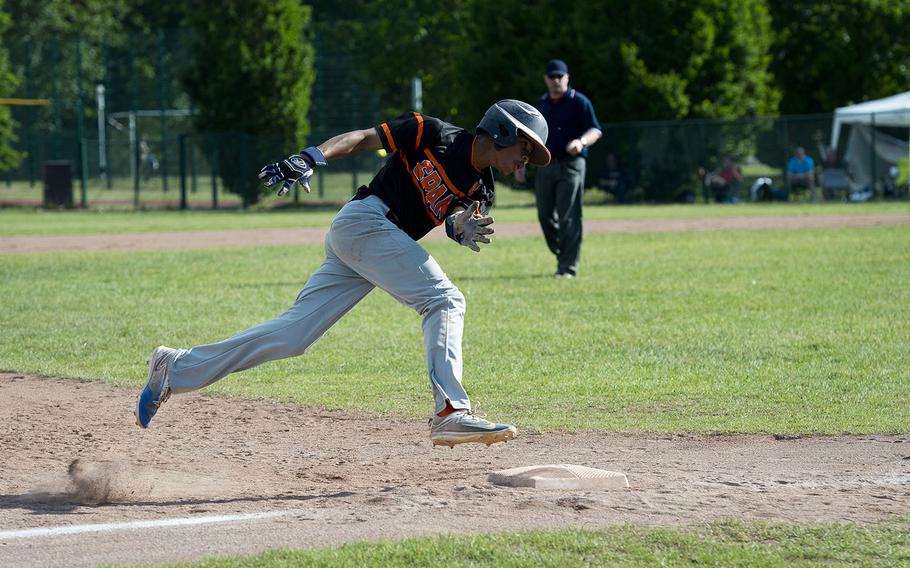 Spangdhalem's Jimmie Montgomery rounds third during the DODEA-Europe baseball tournament at Ramstein Air Base, Germany, on Friday, May 25, 2018.
