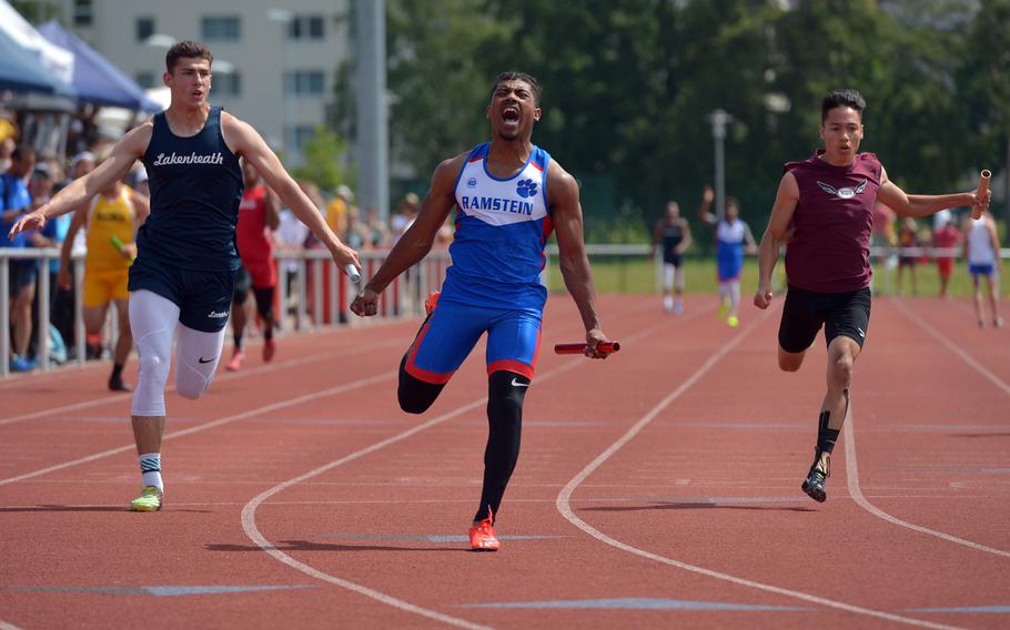 Ramstein's Dominique Arizpe reacts after anchoring the boys 4x100-meter relay at the DODEA-Europe track and field championships in Kaiserslautern, Germany, Saturday May 26, 2018. Arzipe and  teammates Jackie Harris, Nick Lowe and Gevaughn Bracy won in 43.72 seconds ahead of  Lakenheath and Vilseck.