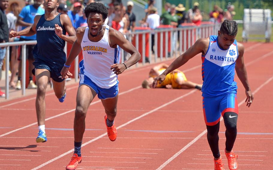 Wiesbaden's Markez Middlebrooks, center, won the boys 200-meter race at the DODEA-Europe track and field championships in 22.38 seconds. He also won the 100-meters in 11.03 seconds.