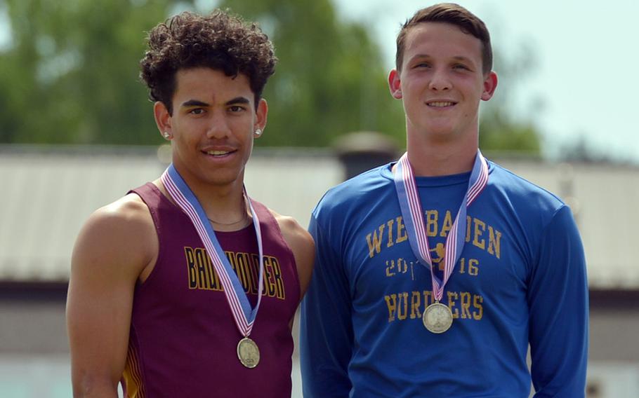 Baumholder's Solo Turgeon, left, and Wiesbaden's Garrett Armel tied for first in the 110-meter hurdles, each running 15.47 seconds. 



