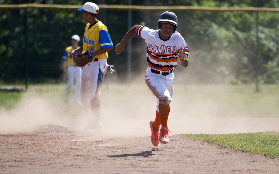 Spangdhalem's Jimmie Montgomery runs to third during the DODEA-Europe Division II/III baseball championship at Ramstein Air Base, Germany, on Saturday, May 26, 2018.
