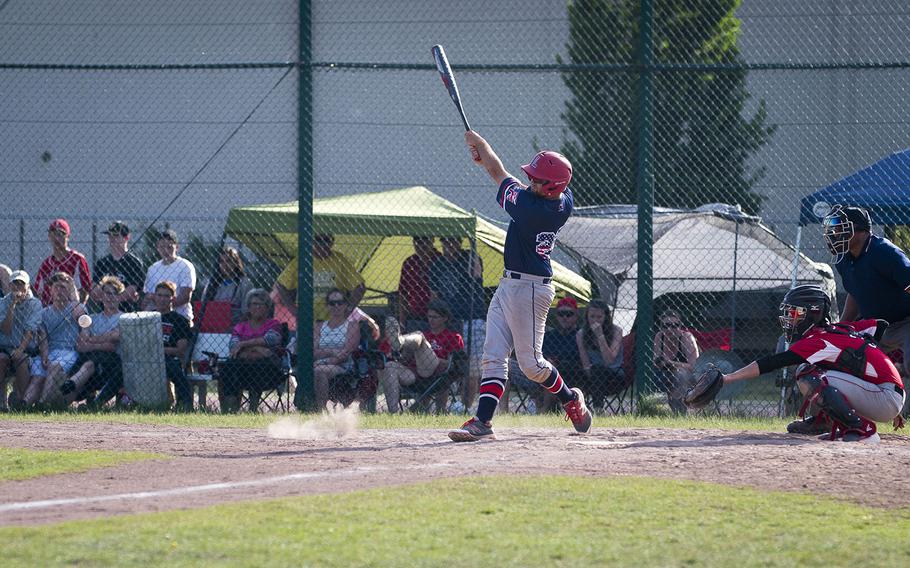 Lakenheath's Drew Sheldon hits the ball during the DODEA-Europe Division I baseball championship at Ramstein Air Base, Germany, on Saturday, May 26, 2018. Lakenheath defeated Kaiserslautern 9-6 to win the title.