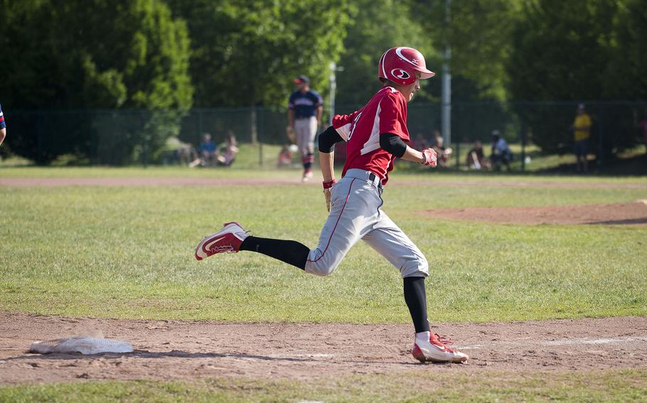 Kaiserslautern's Kaden Senkbeil rounds third and heads to home during the DODEA-Europe Division I baseball championship at Ramstein Air Base, Germany, on Saturday, May 26, 2018.

