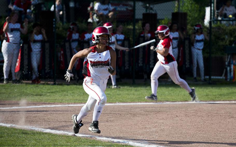 Kaiserslautern's Hien Huynh runs to first during the DODEA-Europe Division I softball championship at Ramstein Air Base, Germany, on Saturday, May 26, 2018.
