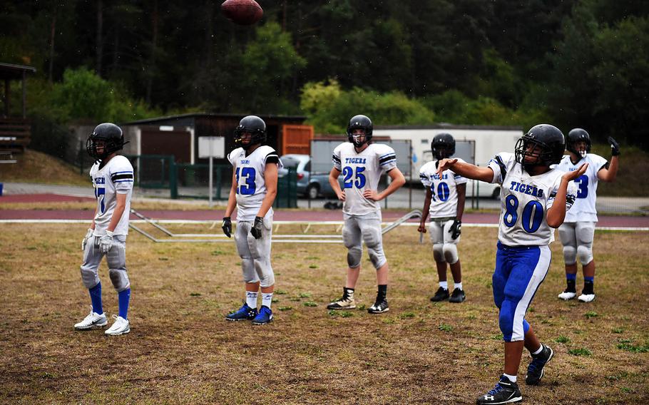 Hohenfels Tiger Anthony Gonzalez passes the footbal, during practice, Friday, Aug. 24, 2018. 
