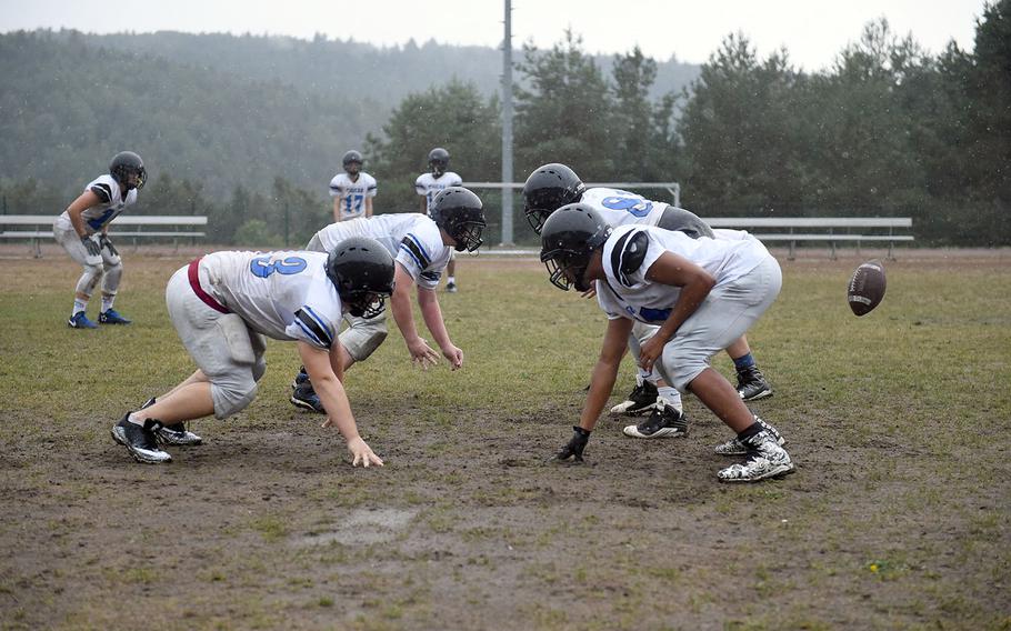 Hohenfels Tigers face each other as the ball is hiked, during practice, Friday, Aug. 24, 2018. 