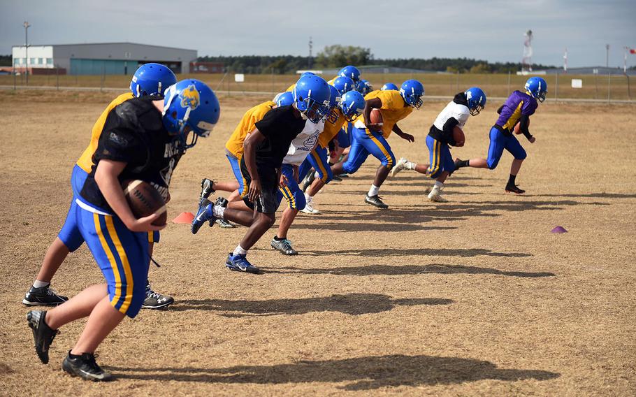 The Ansbach Cougars run together during practice, Monday, August 27, 2018. 