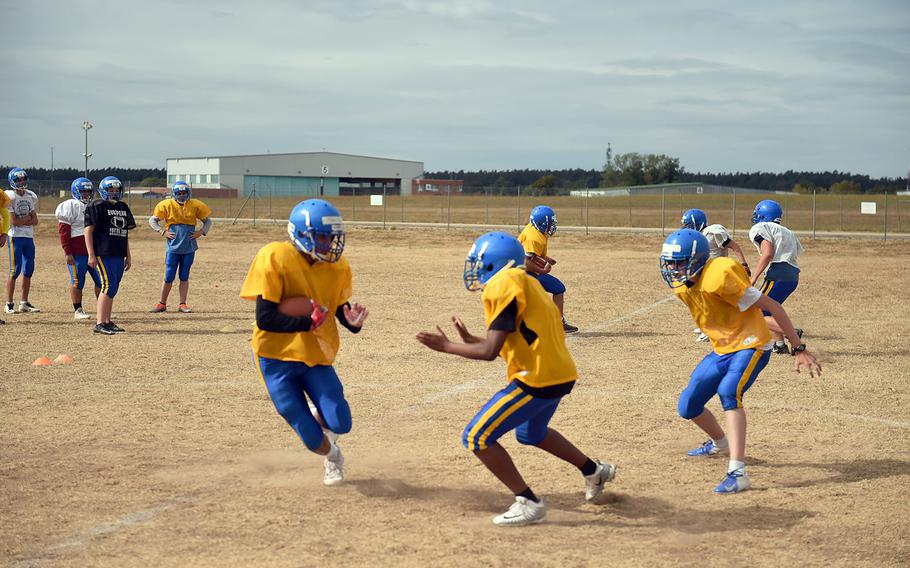 The Ansbach Cougars run drills during practice, Monday, August 27, 2018. 