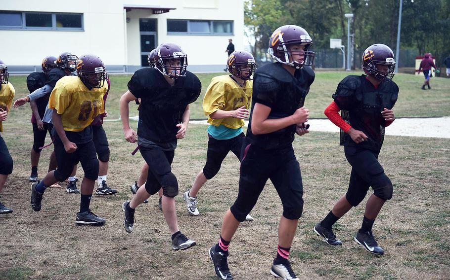 The Vilseck Falcons running together during practice, Friday, Aug. 31, 2018, at Vilseck, Germany. 
