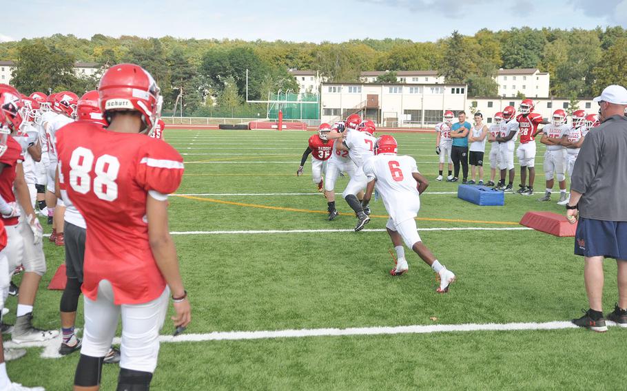 The Kaiserslautern Raiders square off during drills in a recent practice in Kaiserslautern, Germany.