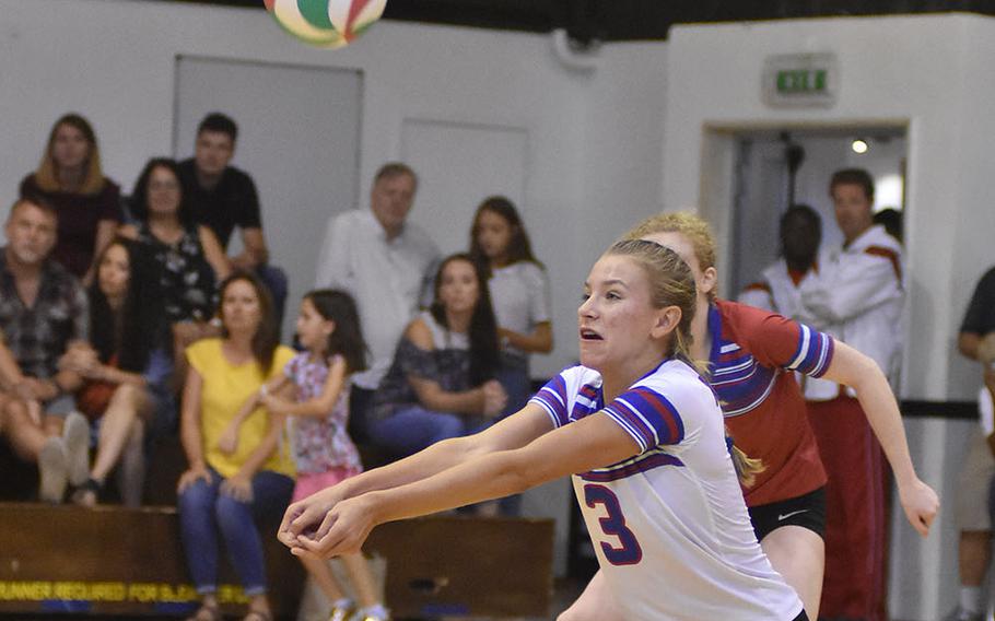 Ramstein's Gigi Stake digs the ball in the Royals' 25-15, 25-23, 15-25, 18-25, 15-6 victory over Vicenza on Friday, Sept. 14, 2018.