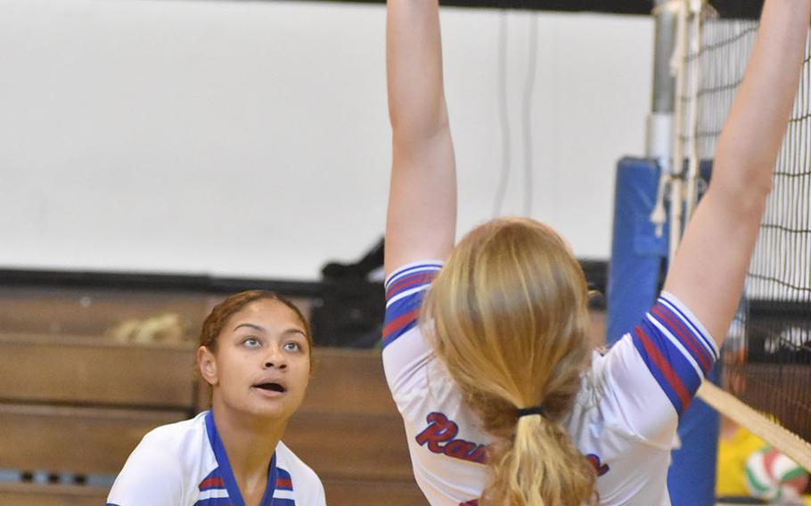 Ramstein's Masaya Archbold watches Izzy Coddington set the ball in the Royals' 25-15, 25-23, 15-25, 18-25, 15-6 victory over Vicenza on Friday, Sept. 14, 2018.