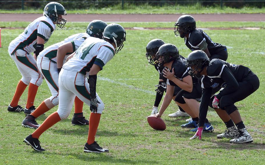 The Hohenfels Tigers prepare to hike the ball as they face off against the AFNORTH Lions during a game at Hohenfels, Germany, Saturday, Sept. 22, 2018. 
