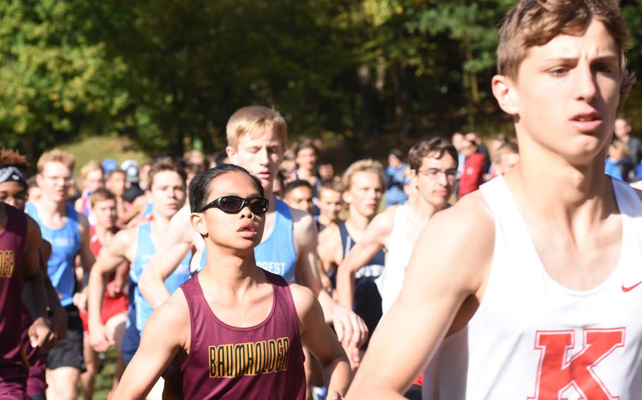 The pack takes off at the start of the boys' race during the Ramstein cross country meet on Saturday, Sept. 29, 2018, in Miesenbach, Germany.