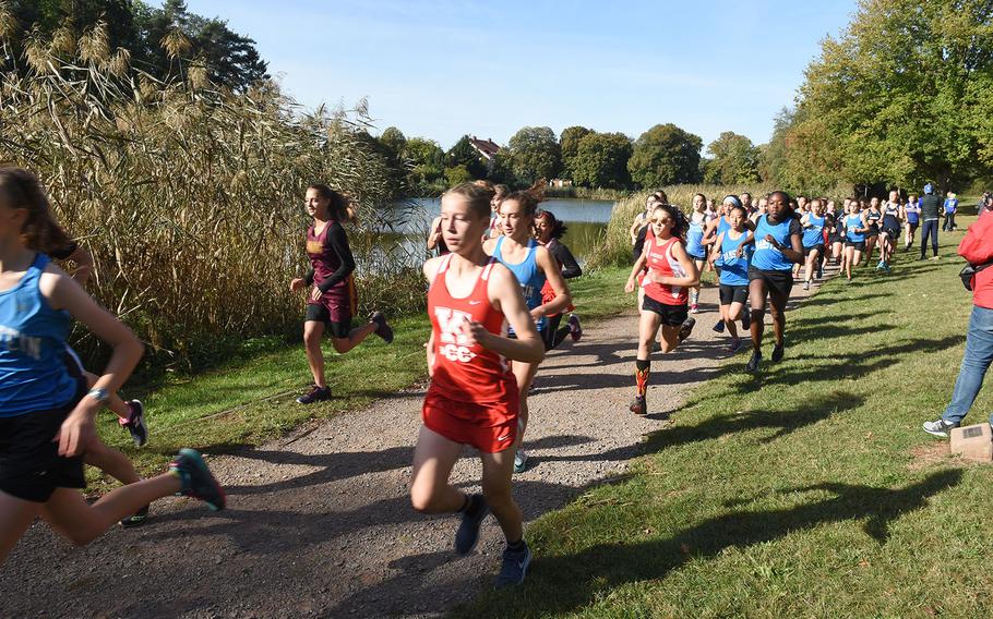 Kaiserslautern's Chloe Martin races towards the front of the pack at the start of the Ramstein cross country meet on Saturday, Sept. 29, 2018, in Miesenbach, Germany.