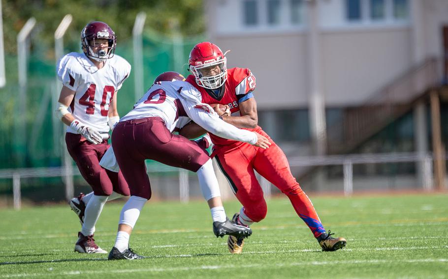 Corey Coombs is hit during the Kaiserslautern vs. Vilseck high school football game in Kaiserslautern, Germany, Saturday Sept. 29, 2018. Kaiserslautern won the game 26-20