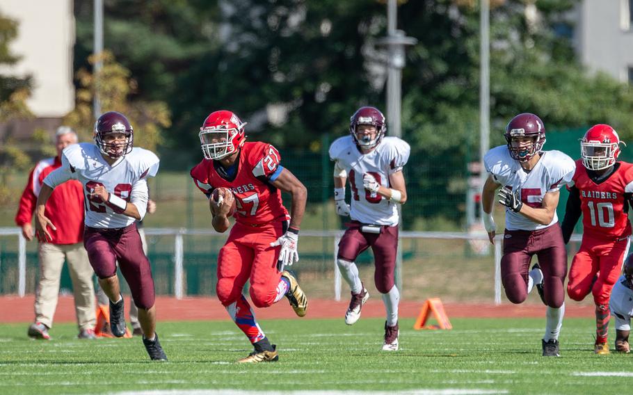 Corey Coombs breaks into the open field during the Kaiserslautern vs. Vilseck high school football game in Kaiserslautern, Germany, Saturday Sept. 29, 2018.  Kaiserslautern won the game 26-20.
