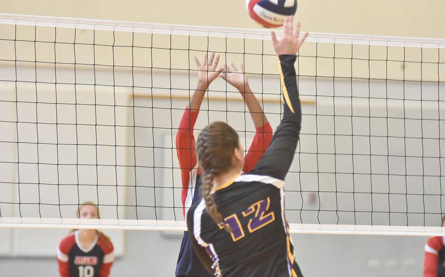 Bahrain's Christina Carpenter-Lopez tips the ball over the net in a match against Aviano on Saturday. The Saints both two times in Bahrain's only visit to Europe before the season-ending championships.